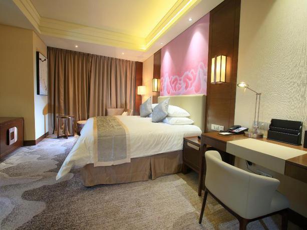 Imagen de la habitación del Hotel Grand New Century Hotel Fuyang. Foto 11