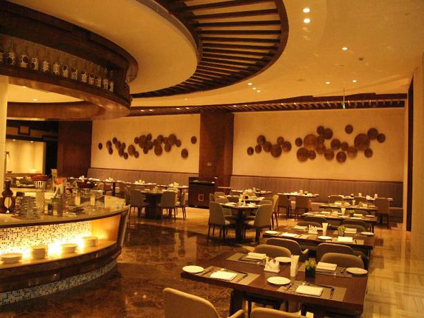 Imagen del bar/restaurante del Hotel Grand New Century Hotel Fuyang. Foto 8