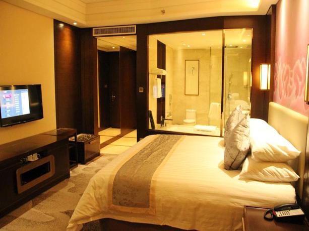 Imagen de la habitación del Hotel Grand New Century Hotel Fuyang. Foto 13