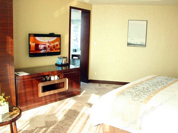 Imagen de la habitación del Hotel Grand New Century Hotel Fuyang. Foto 15