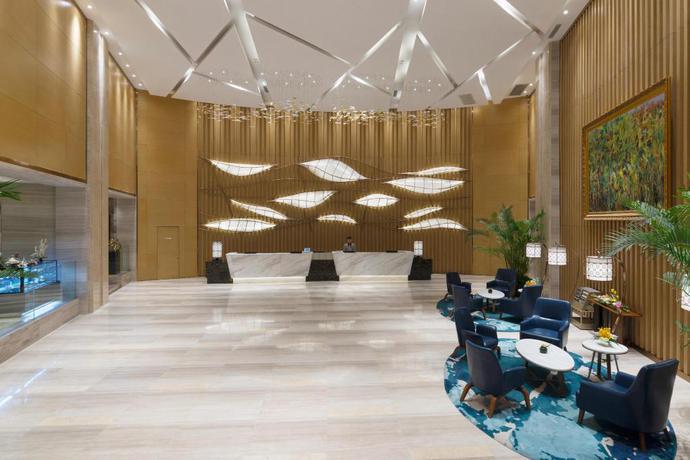 Imagen de los interiores del Hotel Grand New Century Hotel Jingyue Changchun. Foto 8