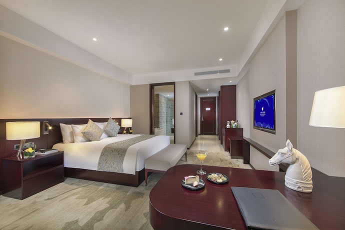 Imagen de la habitación del Hotel Grand New Century Jingyue. Foto 2