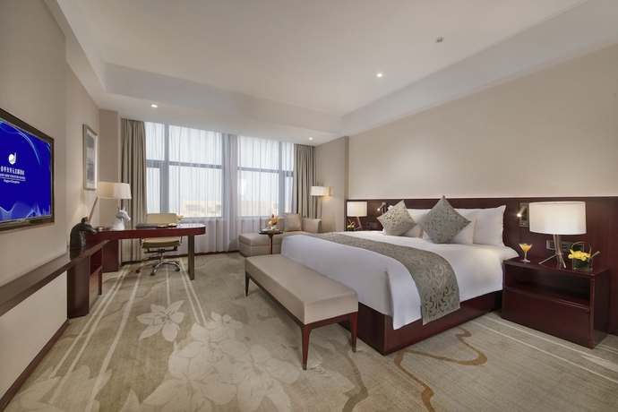Imagen de la habitación del Hotel Grand New Century Jingyue. Foto 3