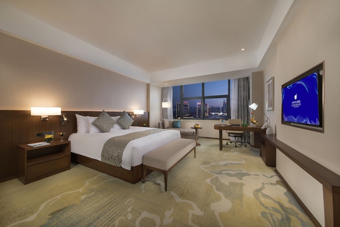 Imagen de la habitación del Hotel Grand New Century Jingyue. Foto 4