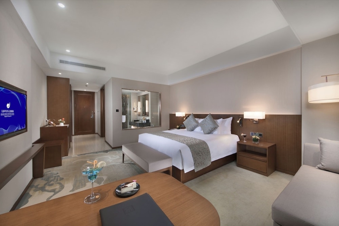 Imagen de la habitación del Hotel Grand New Century Jingyue. Foto 10