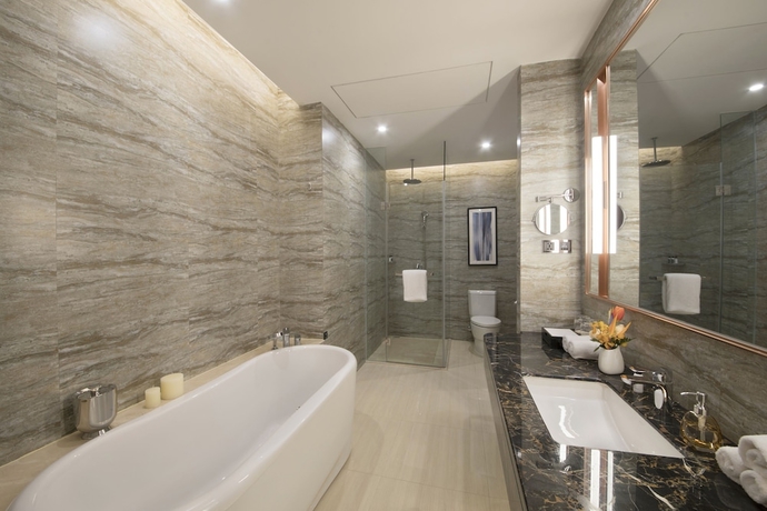 Imagen de la habitación del Hotel Grand New Century Jingyue. Foto 12