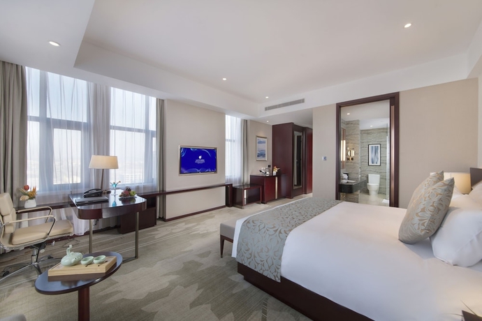 Imagen de la habitación del Hotel Grand New Century Jingyue. Foto 13