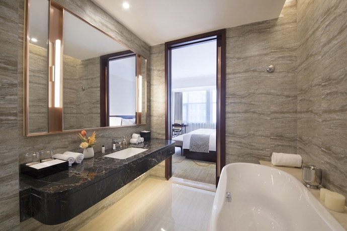 Imagen de la habitación del Hotel Grand New Century Jingyue. Foto 14