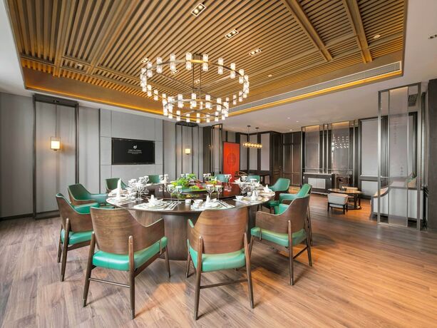 Imagen del bar/restaurante del Hotel Grand New Century Linan Hangzhou. Foto 10