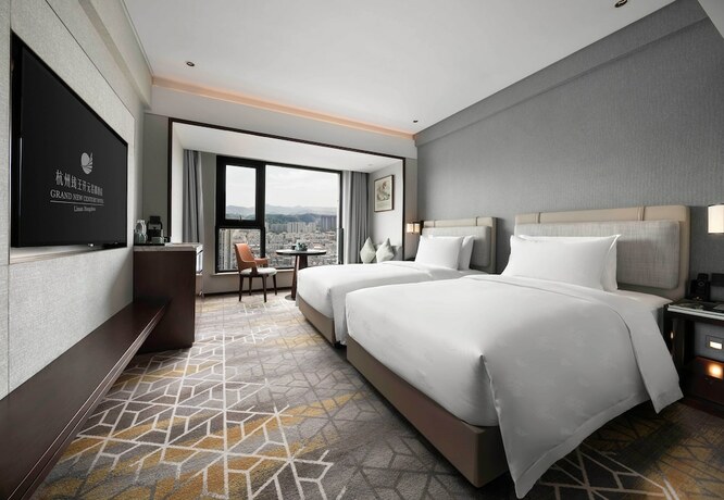Imagen de la habitación del Hotel Grand New Century Linan Hangzhou. Foto 13