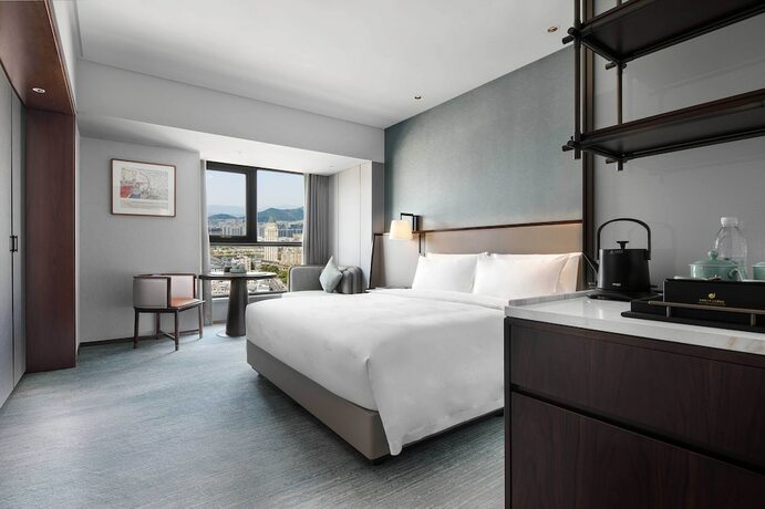 Imagen de la habitación del Hotel Grand New Century Linan Hangzhou. Foto 17