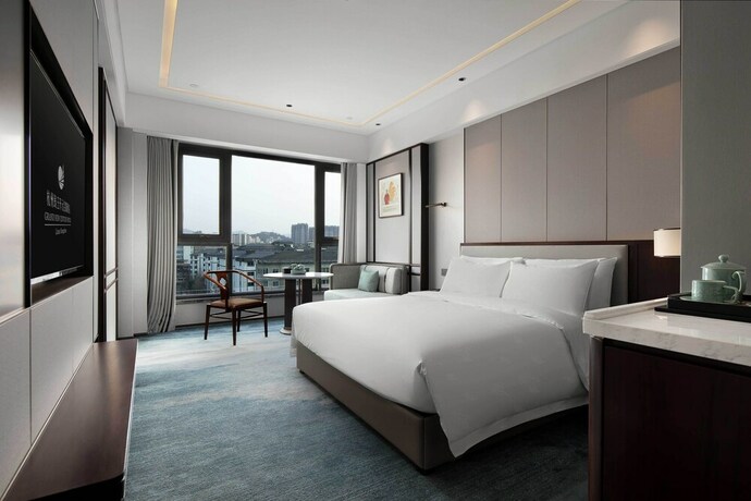 Imagen de la habitación del Hotel Grand New Century Linan Hangzhou. Foto 18