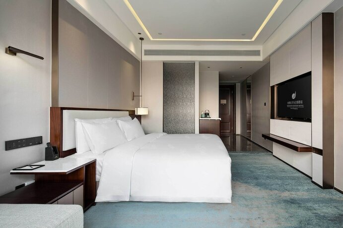 Imagen de la habitación del Hotel Grand New Century Linan Hangzhou. Foto 23