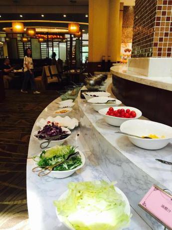 Imagen del bar/restaurante del Hotel Grand New Century Ninghai Jinhai. Foto 5