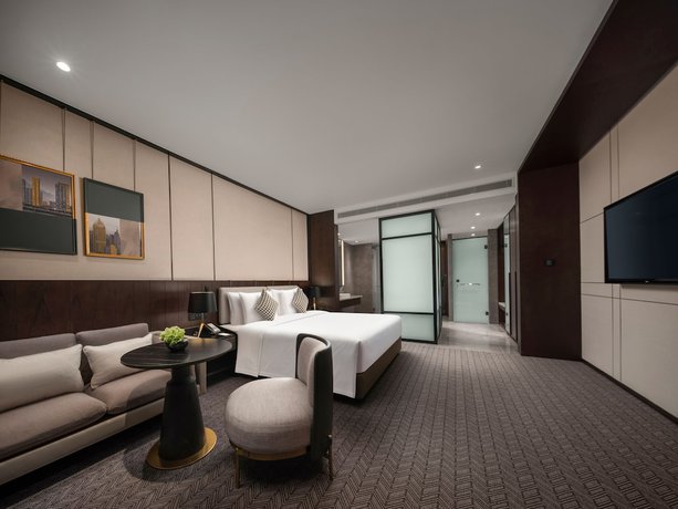 Imagen de la habitación del Hotel Grand New Century Wenzhou. Foto 10