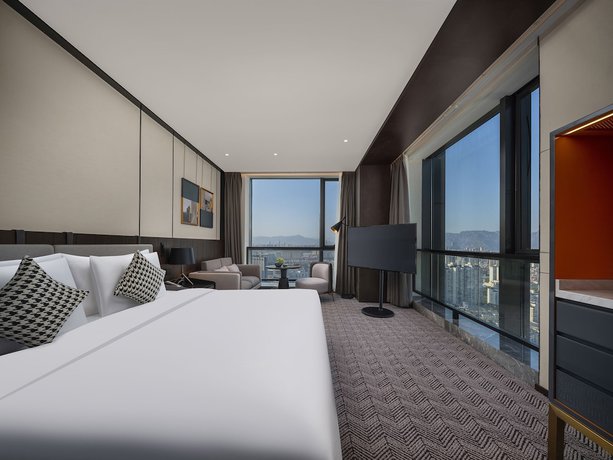 Imagen de la habitación del Hotel Grand New Century Wenzhou. Foto 11