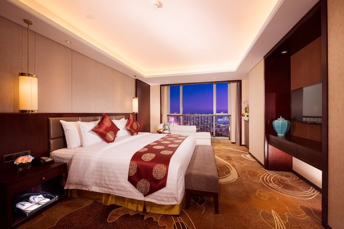 Imagen de la habitación del Hotel Grand New Century Xi'an. Foto 7