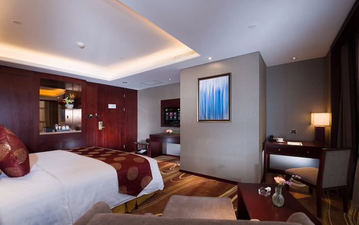 Imagen de la habitación del Hotel Grand New Century Xi'an. Foto 9