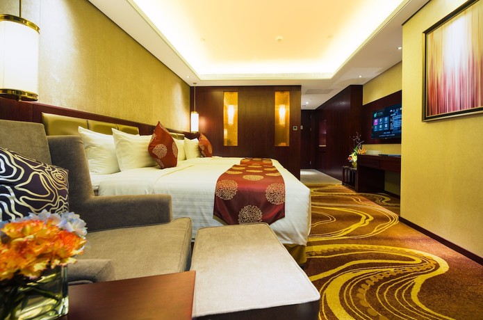 Imagen de la habitación del Hotel Grand New Century Xi'an. Foto 15