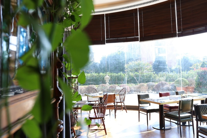Imagen del bar/restaurante del Hotel Grand New Century Yixing. Foto 2