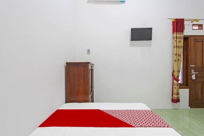 Imagen de la habitación del Hotel Grand New Si Jago Mitra RedDoorz. Foto 10