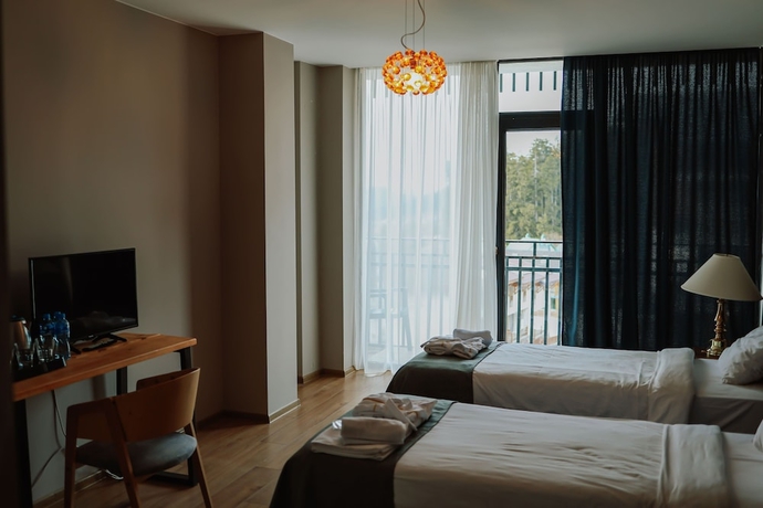 Imagen de la habitación del Hotel Grand Noel Bakuriani. Foto 14