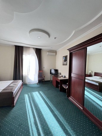 Imagen de la habitación del Hotel Grand Nur. Foto 14