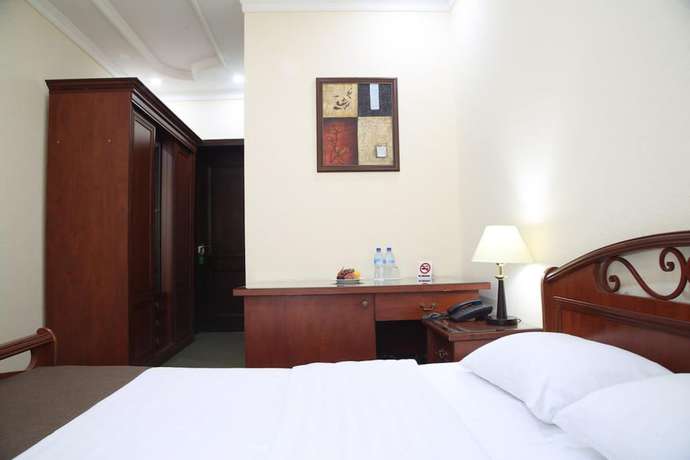 Imagen de la habitación del Hotel Grand Nur. Foto 15