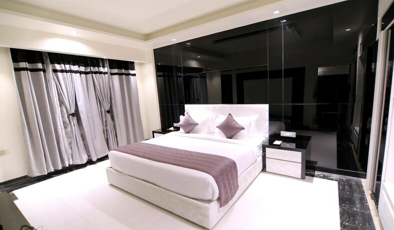 Imagen de la habitación del Hotel Grand Orchid. Foto 12