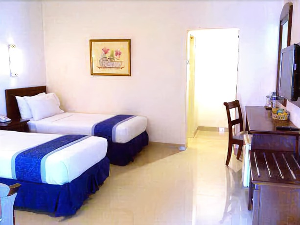 Imagen de la habitación del Hotel Grand Orchid Solo. Foto 4