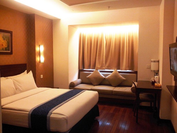 Imagen de la habitación del Hotel Grand Orchid Solo. Foto 11