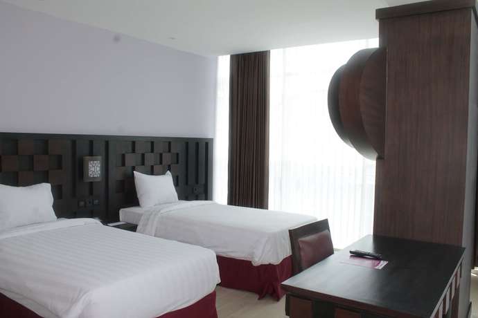 Imagen de la habitación del Hotel Grand Orchid Yogyakarta. Foto 5