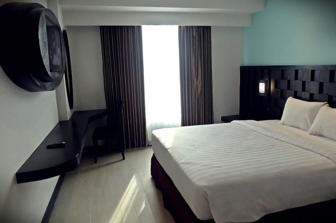 Imagen de la habitación del Hotel Grand Orchid Yogyakarta. Foto 6