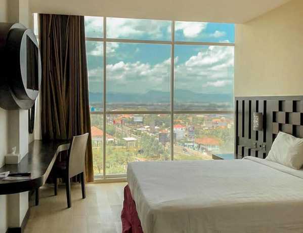 Imagen de la habitación del Hotel Grand Orchid Yogyakarta. Foto 7