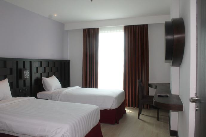 Imagen de la habitación del Hotel Grand Orchid Yogyakarta. Foto 9