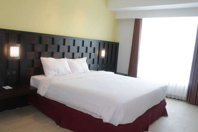 Imagen de la habitación del Hotel Grand Orchid Yogyakarta. Foto 11
