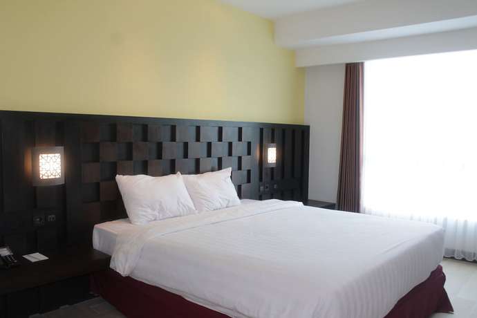 Imagen de la habitación del Hotel Grand Orchid Yogyakarta. Foto 14