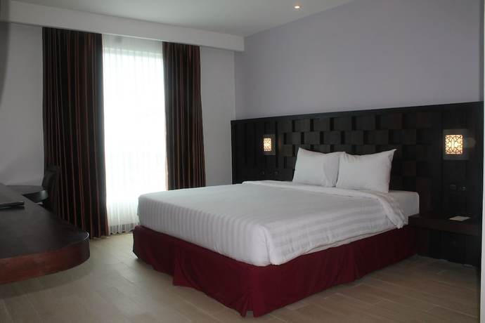 Imagen de la habitación del Hotel Grand Orchid Yogyakarta. Foto 15