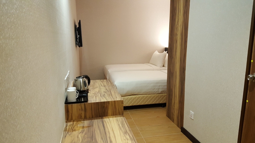 Imagen de la habitación del Hotel Grand Orient Perai. Foto 11