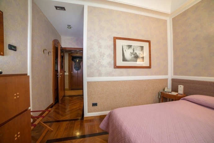 Imagen de la habitación del Hotel Grand Ortigia Siracusa. Foto 4