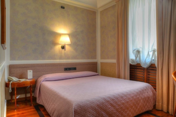 Imagen de la habitación del Hotel Grand Ortigia Siracusa. Foto 9