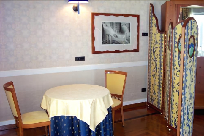 Imagen de la habitación del Hotel Grand Ortigia Siracusa. Foto 11