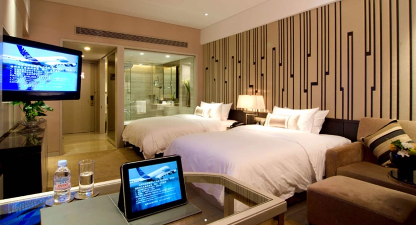 Imagen de la habitación del Hotel Grand Pacific Ningbo. Foto 17