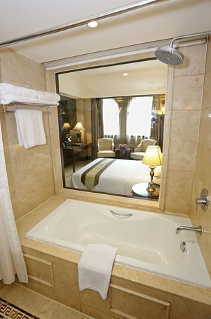 Imagen de la habitación del Hotel Grand Palace, Guangzhou. Foto 9