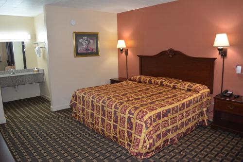 Imagen de la habitación del Hotel Grand Palace Inn. Foto 6