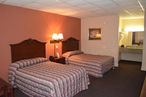 Imagen de la habitación del Hotel Grand Palace Inn. Foto 7