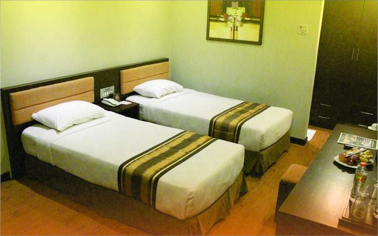 Imagen de la habitación del Hotel Grand Palace Makassar. Foto 4
