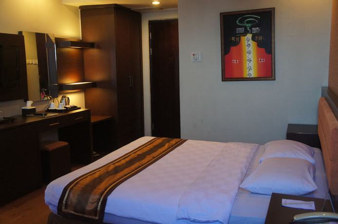 Imagen de la habitación del Hotel Grand Palace Makassar. Foto 6