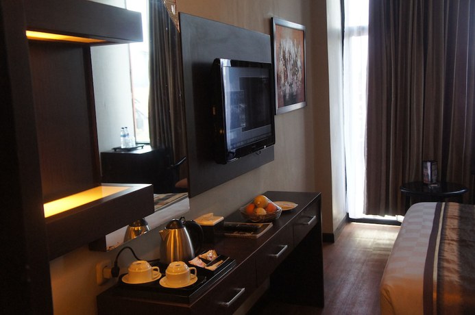 Imagen de la habitación del Hotel Grand Palace Makassar. Foto 7