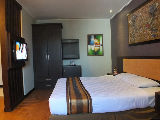 Imagen de la habitación del Hotel Grand Palace Makassar. Foto 10